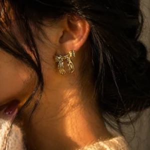 Swarns Opaline Bow Studs